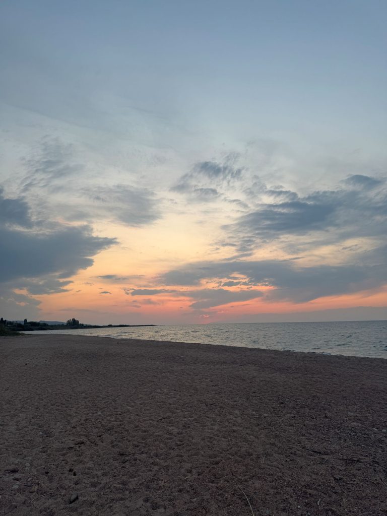 Sunset from Issyk-Kul Lake beach shore, Tosor